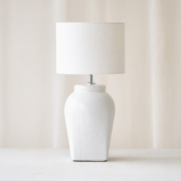 Hekla Table Lamp, white, timeless accessory. Contemporary and versatile piece that provides a flair of simplicity in any home. Available at $280.