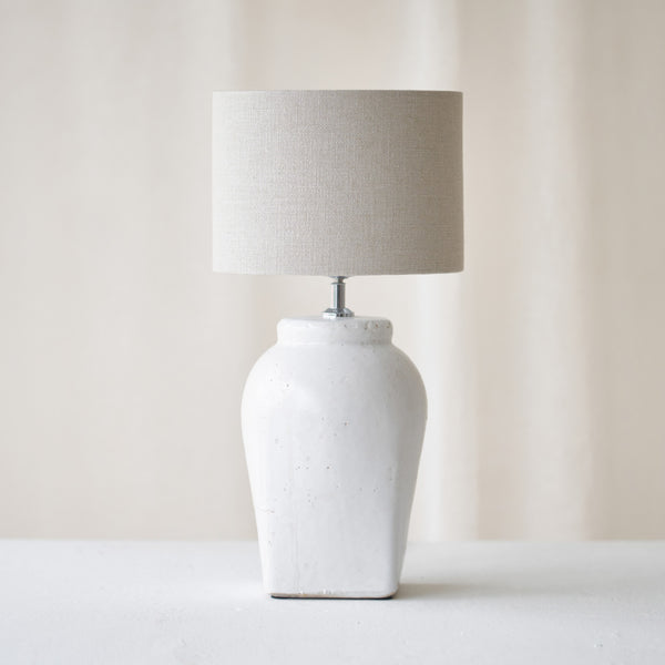 Hekla Table Lamp, white, timeless accessory. Contemporary and versatile piece that provides a flair of simplicity in any home. Available at $280.