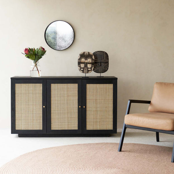 Hudson Black Teak Rattan Sideboard, 3 Doors, Square Webbing. Rattan details and metal handles with generous storage. Versatile and timeless piece. Available at $3280.