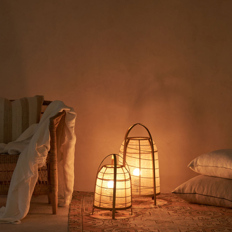 Jacinto Table Lamp, wood and light mesh netting. Warm and delicate piece of accessory that brightens up a room. Available in different sizes from $200.