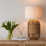 Alifia Table Lamp, natural and beautifully weaved. Chic and stylish piece. It is a versatile piece that provides an airy feel in any home. Available at $280.