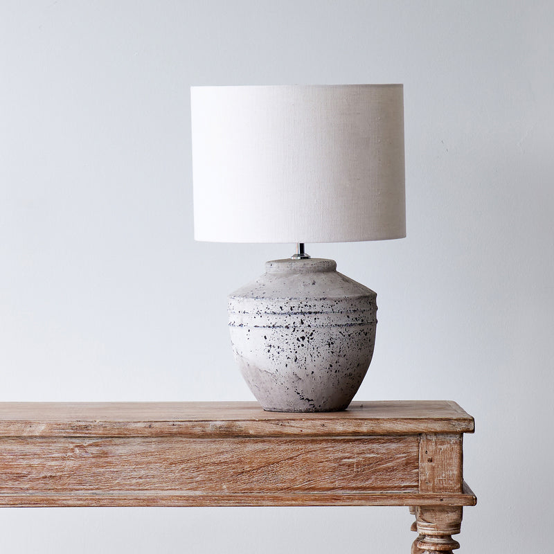 Toba Table Lamp, textured finish. Unique and versatile piece that provides a touch of drama in any home. Available at $360.