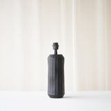 The Levy table lamp is the perfect companion for a side table or desk. This lamp features a black finish and is a stylish addition for any home, with textures that add a finishing touch. Available at $180. Originals Furniture Singapore – Singapore's Leading Furniture Store, celebrating 20 years of authentic furniture.