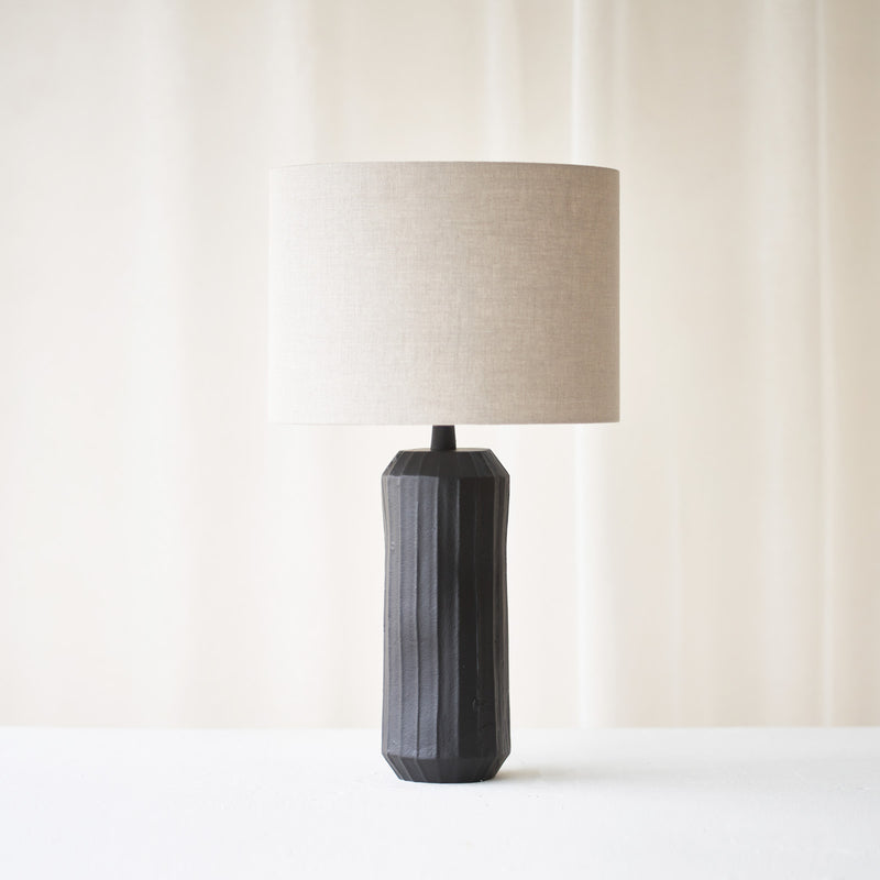 The Levy table lamp is the perfect companion for a side table or desk. This lamp features a black finish and is a stylish addition for any home, with textures that add a finishing touch. Available at $180. Originals Furniture Singapore – Singapore's Leading Furniture Store, celebrating 20 years of authentic furniture.