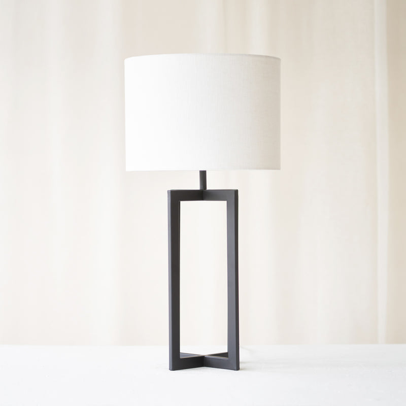 Mace Table Lamp, black and contemporary shaped. Minimalistic and stylish piece. It is a versatile piece that provides a touch of luxury in any home. Available at $280.