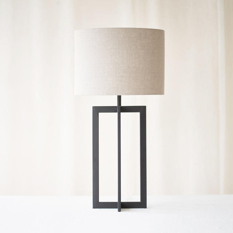 Mace Table Lamp, black and contemporary shaped. Minimalistic and stylish piece. It is a versatile piece that provides a touch of luxury in any home. Available at $280.