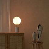 Medina Table Lamp, marble base and glass shade. Bold and timeless statement piece. It is a functional piece that provides a touch of luxury in any home. Available at $380.