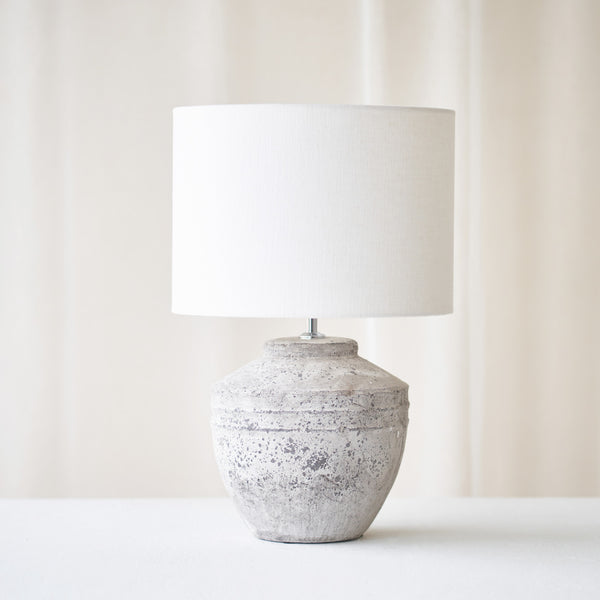Toba Table Lamp, textured finish. Unique and versatile piece that provides a touch of drama in any home. Available at $360.