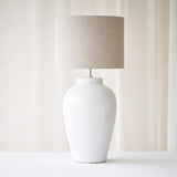 Vesuvius Table Lamp, white, timeless accessory. Contemporary and versatile piece that provides a flair of simplicity in any home. Available at $280.