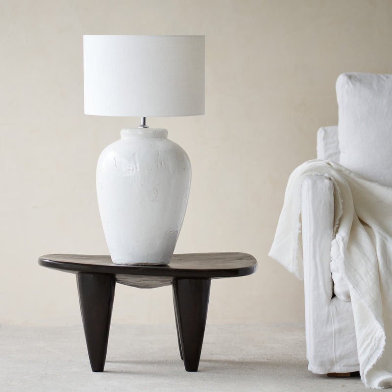 Vesuvius Table Lamp, white, timeless accessory. Contemporary and versatile piece that provides a flair of simplicity in any home. Available at $280.